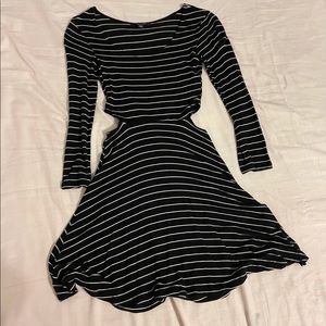 Black dress with white stripes.